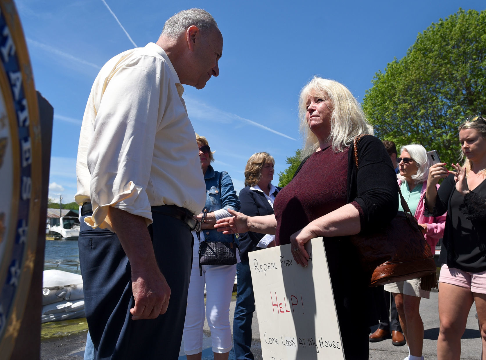 Schumer tours flood damage 1.JPG